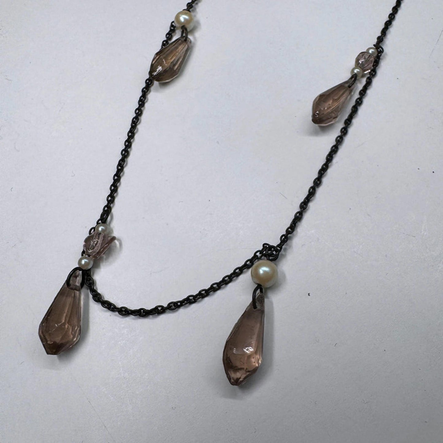 Vintage necklace with hanging pink glass crystals