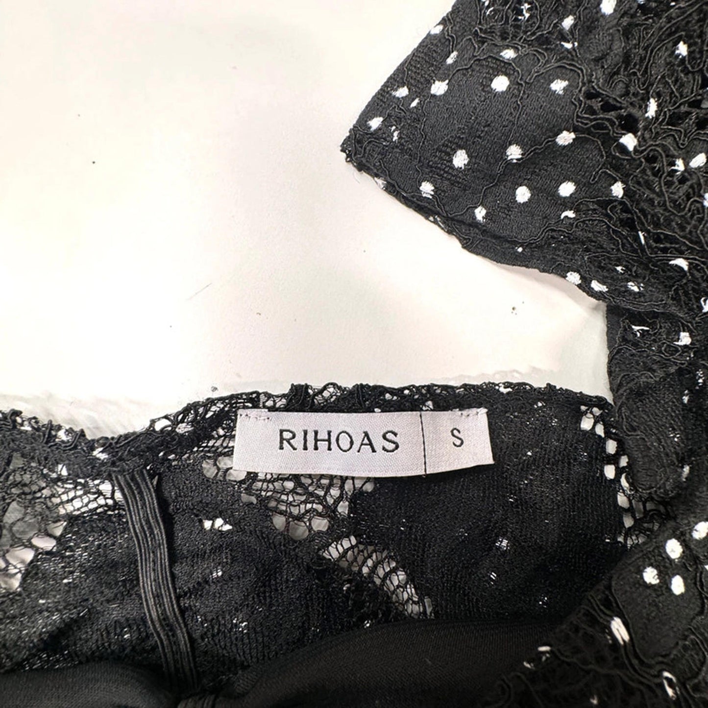 Rihoas black lace crop top with puff sleeves