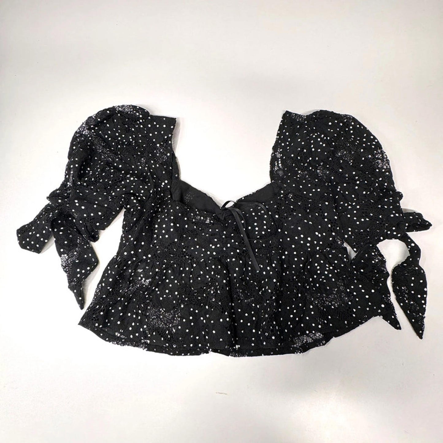 Rihoas black lace crop top with puff sleeves