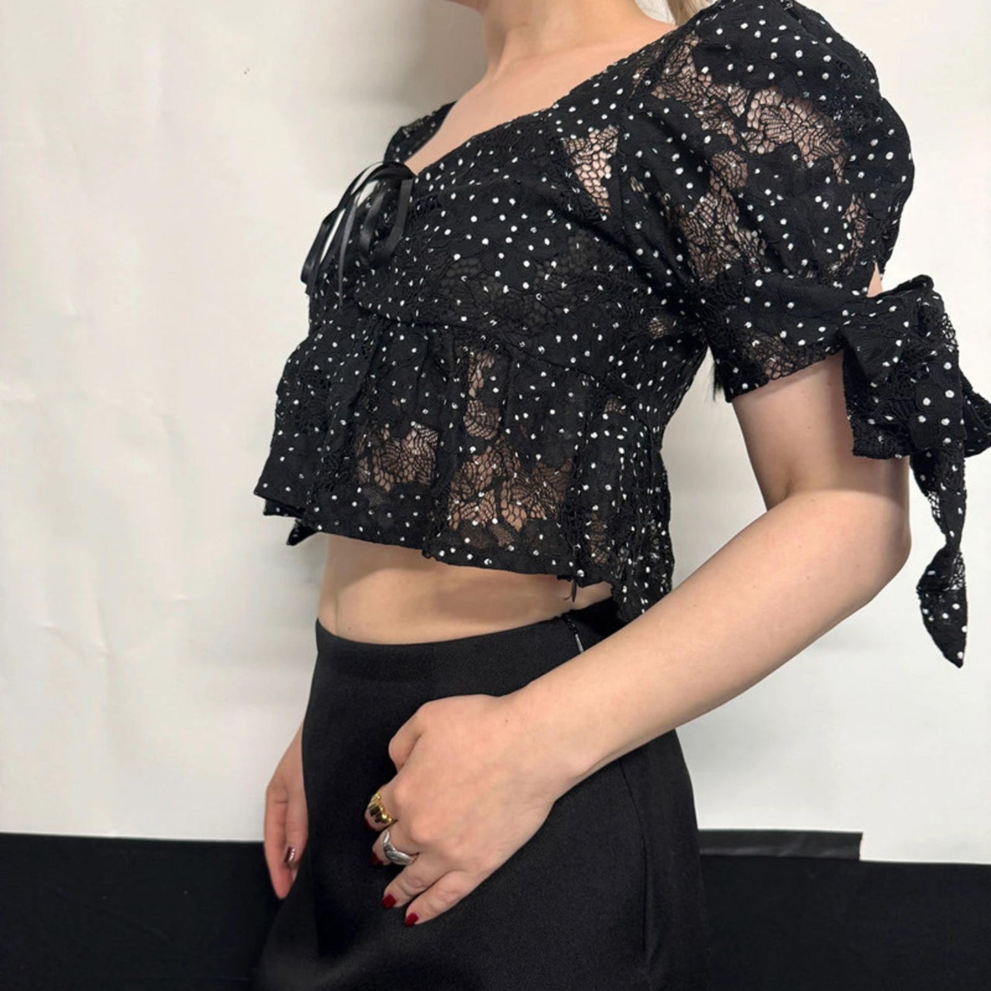 Rihoas black lace crop top with puff sleeves