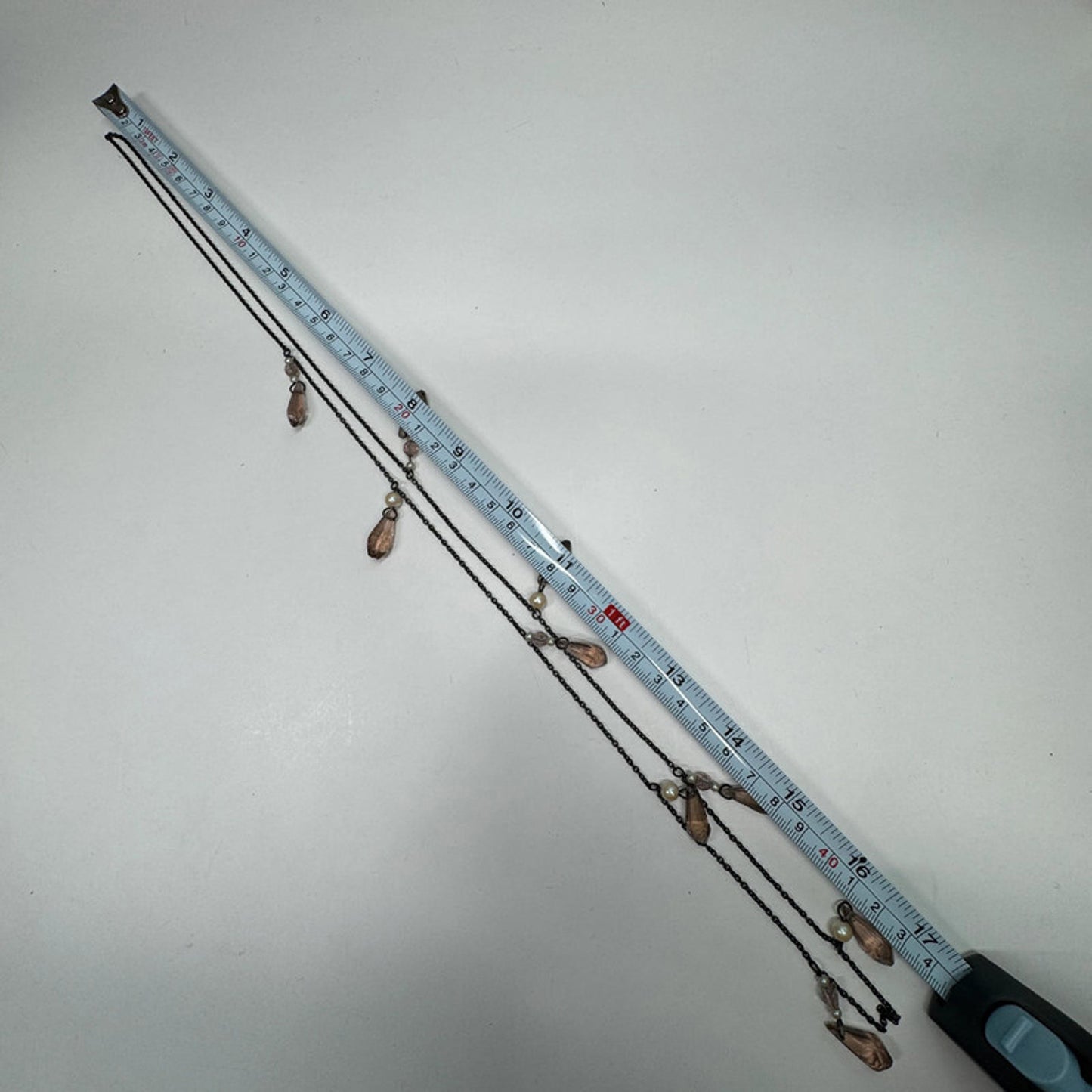 Vintage necklace with hanging pink glass crystals