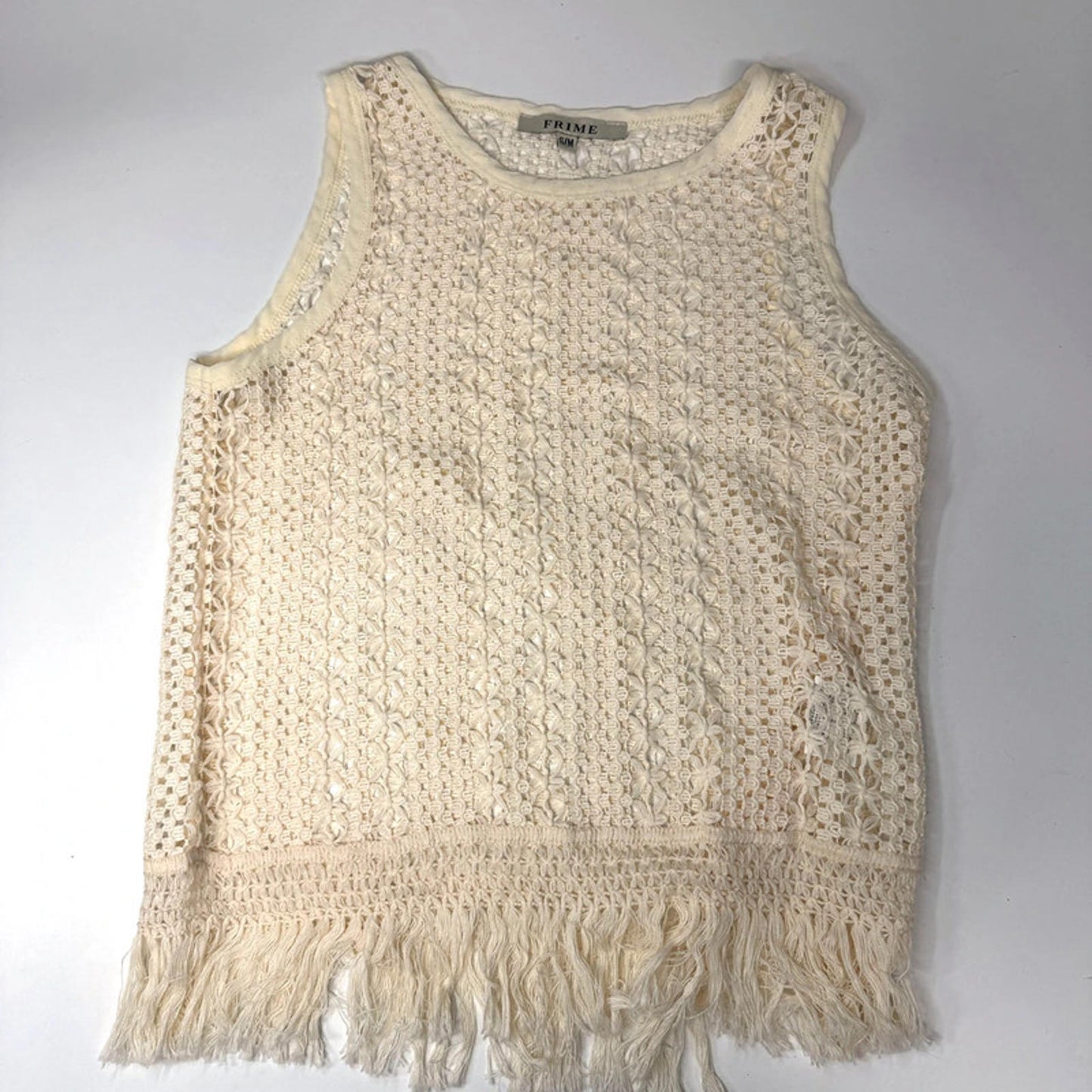 Vintage sleeveless crochet lace top with fringe hem