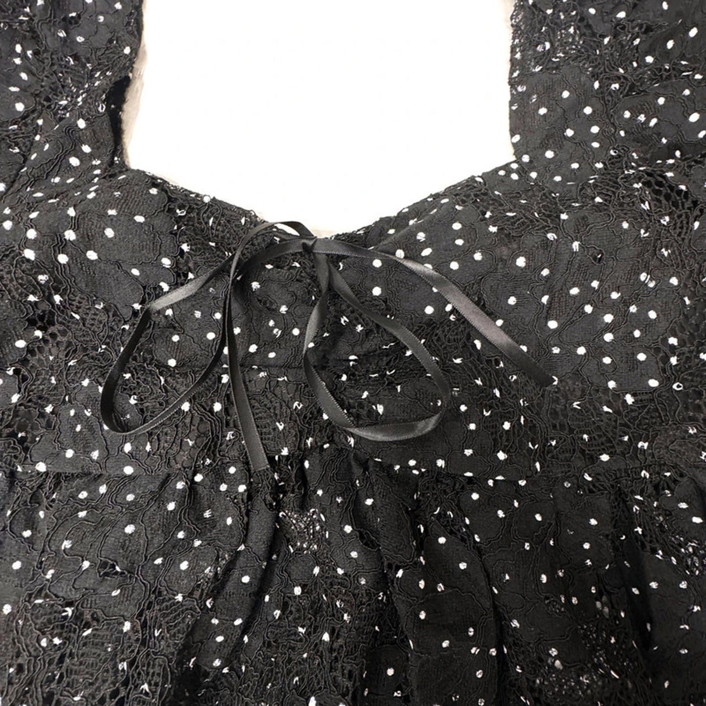 Rihoas black lace crop top with puff sleeves