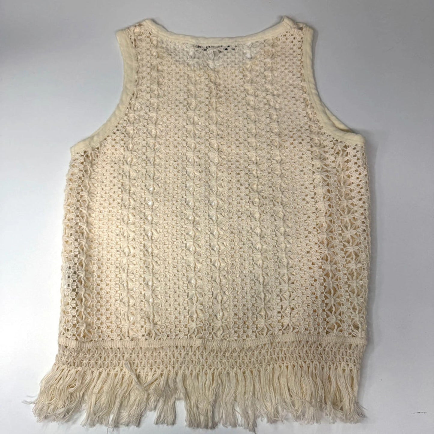 Vintage sleeveless crochet lace top with fringe hem