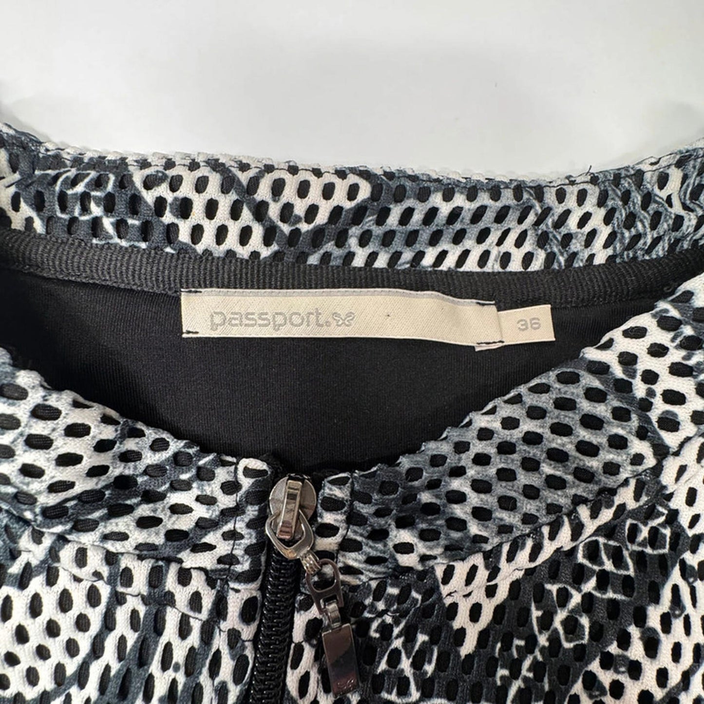 Passport black and white mesh zip-up top